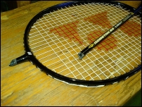 raquette de badminton cassée